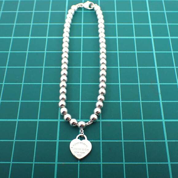 TIFFANY Silver Heart Charm Bracelet